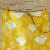 Headlong Hare Yellow Ochre Tea Towel